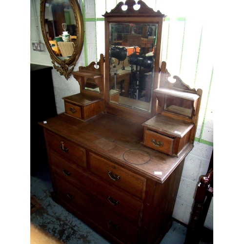 377 - Early 20th C oak dressing chest with raised mirror back above two short and two long drawers (width ... 