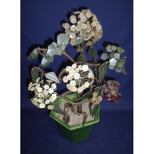 15 - 20th C Chinese carved hardstone potted hydrangea in green glazed base (height 53cm)