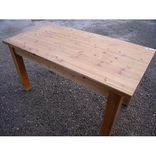 328 - Heavy pine rectangular kitchen table on square supports (77cm x 152cm x 78cm)