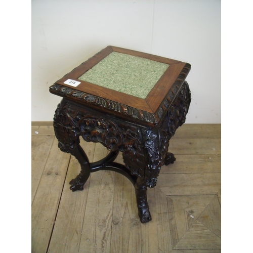 249 - Chinese carved hardwood jardinière stand with rectangular top inset with green marble panel, on four... 