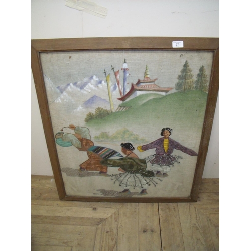 37 - Large framed Tibetan style wool work panel depicting various dancing figures (73cm x 80cm including ... 