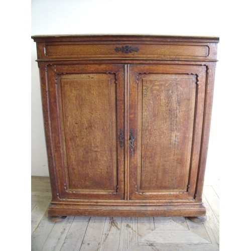 266 - 19th C oak side cabinet with single drawer above two panelled cupboard doors with shelved interior, ... 