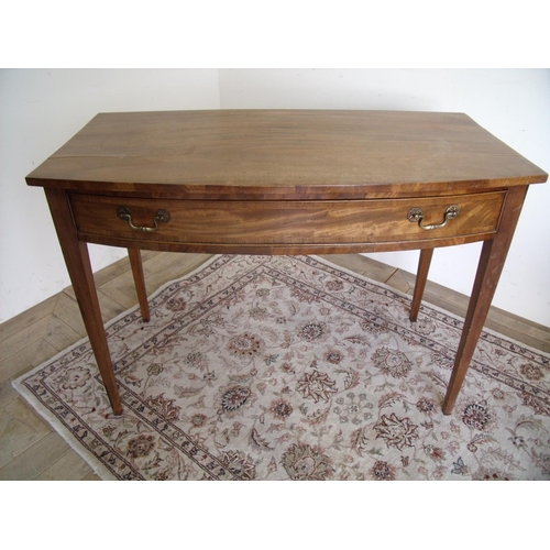 271 - Late 19th C mahogany bow front single drawer side table on square tapering supports (width 106cm)