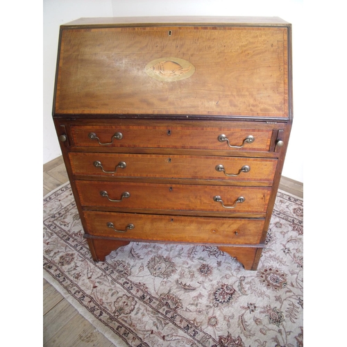 272 - Edwardian mahogany inlaid bureau with fall front revealing fitted interior above four drawers (width... 