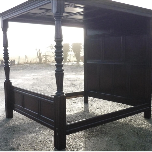 247 - Quality reproduction oak panelled four poster bedstead