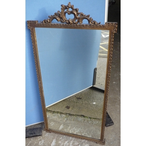 279 - Gilt framed rectangular wall mirror (54cm x 105cm)