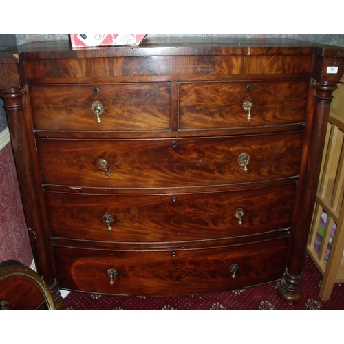 107 - Victorian mahogany bow front chest of two short above three long drawers, with turned column support... 