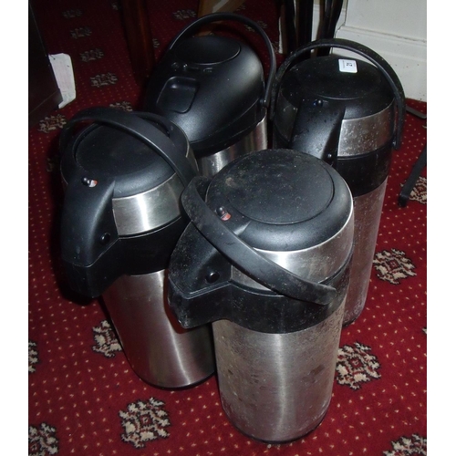 21 - Four vacuum dispensing beverage flasks