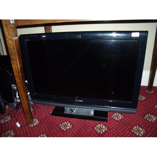 26 - Sony 31 inch flat screen TV with remote