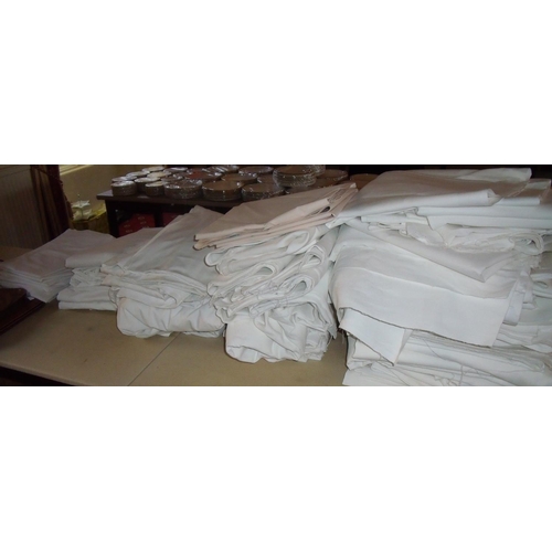 34 - Large selection of table clothes, table linen etc