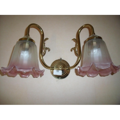 63 - Seven brass twin branch wall light fittings