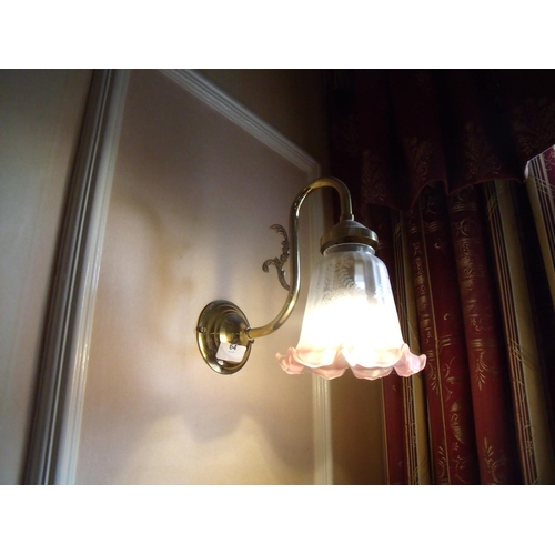 64 - Eight single branch brass wall light fittings