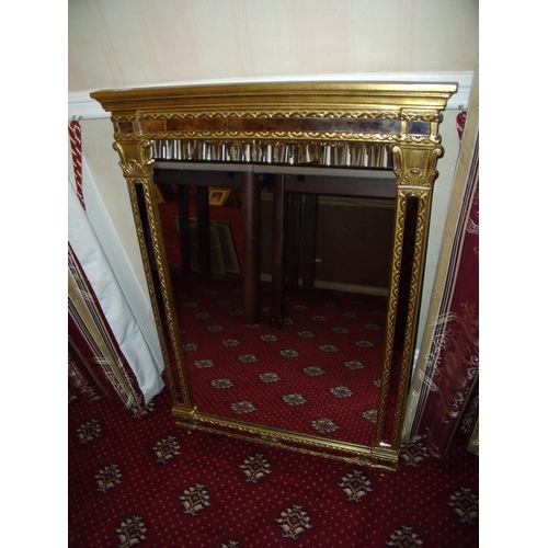 79 - Modern reproduction 18th C style gilt framed wall mirror (65cm x 91cm)