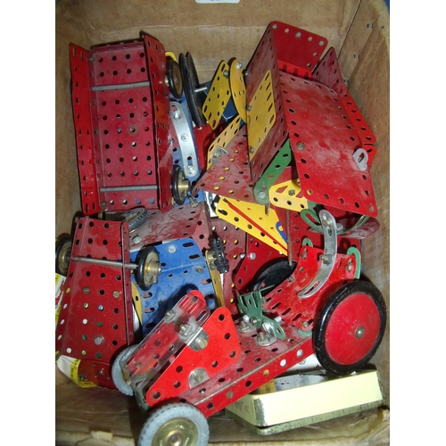 190 - Selection of mostly red, yellow and blue Meccano including various wheels, part made vehicles etc