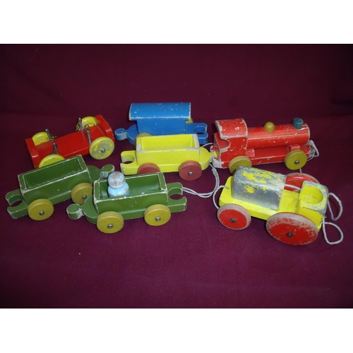 181 - Selection of wooden pull-along trains