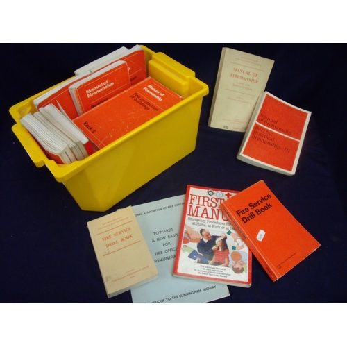 12 - Selection of various fire service booklets, manuals, various enamel and other badges etc