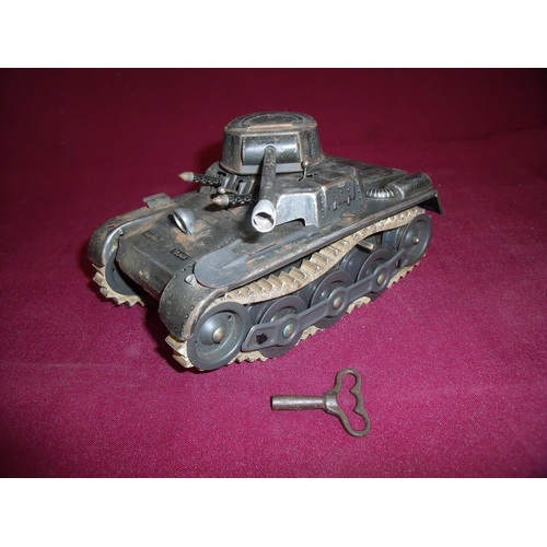 166 - Tin plate clockwork Gama tank