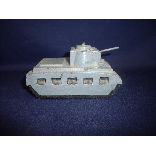 164 - Heavy cast metal and painted figure of a WWII period tank (13cm x 8cm x 7cm)