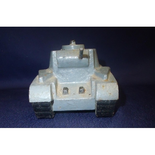 164 - Heavy cast metal and painted figure of a WWII period tank (13cm x 8cm x 7cm)