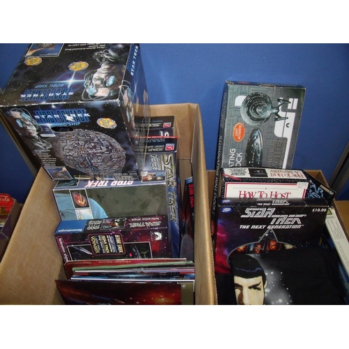 152 - A large selection of Star Trek figures, puzzles etc including Borg Que Box, Worf Mug with certificat... 