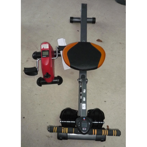 76 - Rowing machine and leg exercise machine