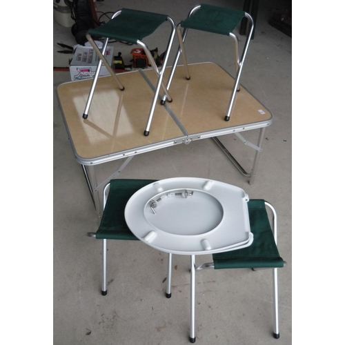 89 - Small folding picnic table with four folding stools and a toilet seat