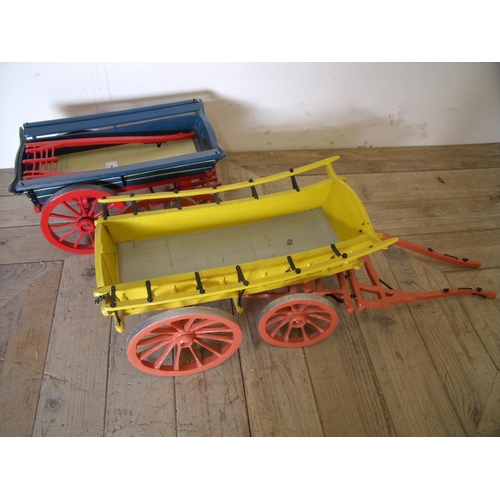 124 - Two large handmade wooden model carts