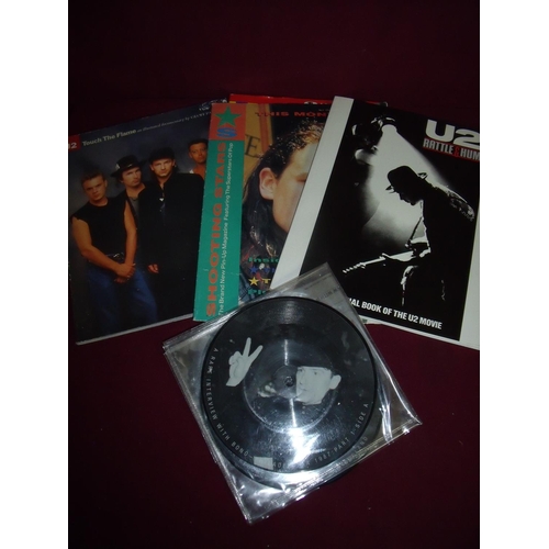 103 - U2 limited edition interview picture 45 RPM discs and U2 booklets including 'Touch the Flame', 'Maki... 