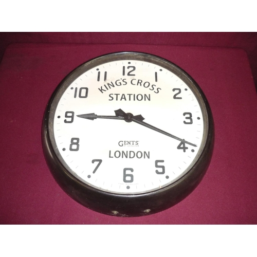23 - Gents of Leicester electric wall clock, the dial marked Kings Cross Station London in Bakelite style... 
