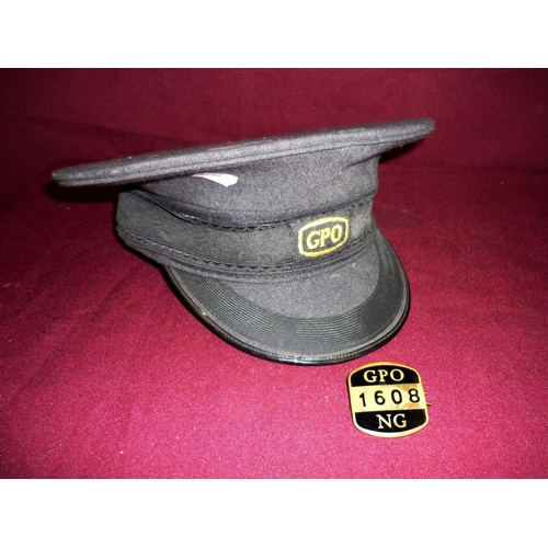 25 - GPO peaked cap and brass & enamel GPO NG badge. No 1608 (2)