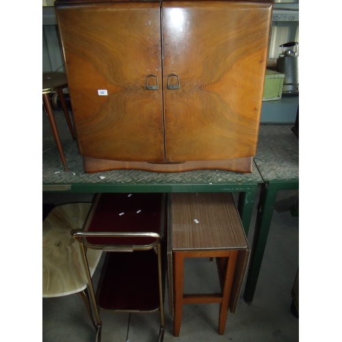 409 - Retro walnut two drawer cabinet, a two tier trolley, onyx coffee table, drop leaf table, mahogany oc... 