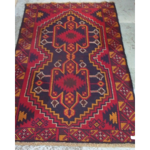 439 - Old Baluchi rug (182cm x 104cm)