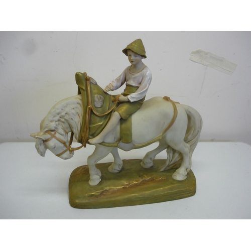 10 - Large Royal Dux figure of a boy riding heavy horse with harness collar, the base with painted and im... 