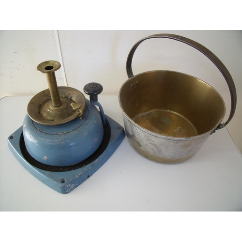 128 - Wall mounted hand operated alarm bell, a brass jam pan and candlestick (3)