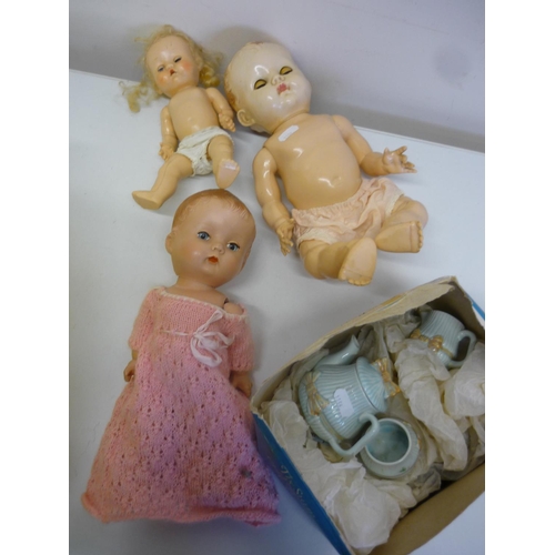 132 - Child's ceramic dolls tea service and a selection of 1950s and later dolls