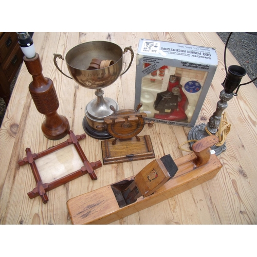 133 - Vintage wood working plane, large plated trophy cup, microscope, table lamps etc