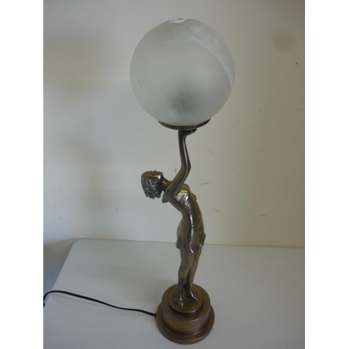25 - Decorative bronze effect early 20th C style lamp in the form of a lady holding a globe (65cm high)