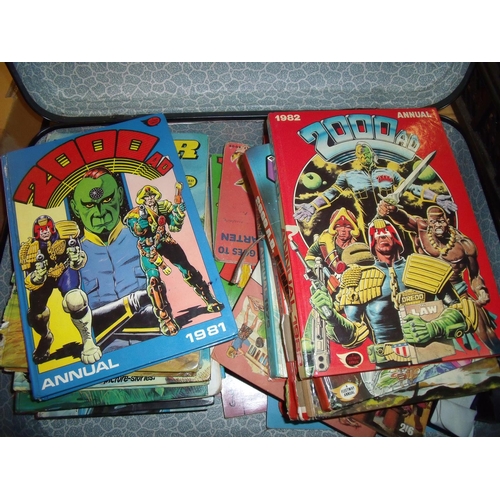 265 - Suitcase containing a large selection of various children's annuals from the 1970/80s including Tige... 