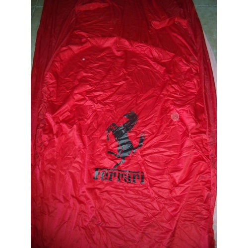 267 - Ferrari car cover and four seat covers, with carry bags