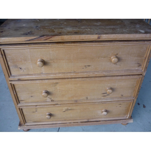 284 - Large pine three drawer chest (107cm x 54cm x 94cm)