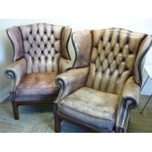 288 - Pair of superb quality, country house style, wide seated leather wing back chairs with deep button b... 