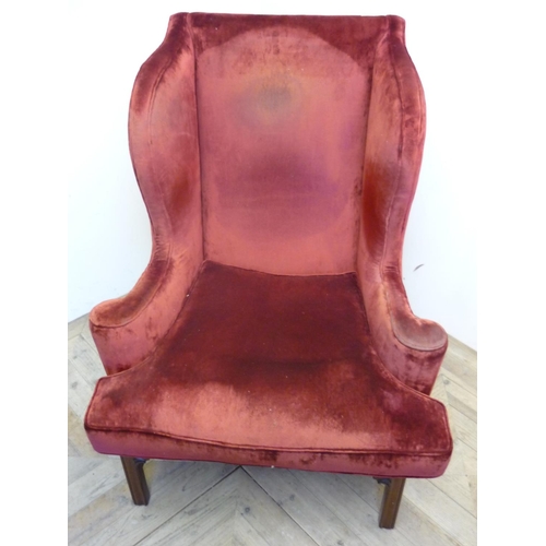 289 - Large country house style wingback  upholstered armchair with scroll back arms, on mahogany supports... 