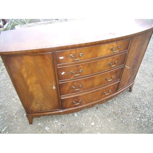 300 - Mahogany dining suite comprising of a bow fronted side cabinet with 4 central drawers flanked by two... 
