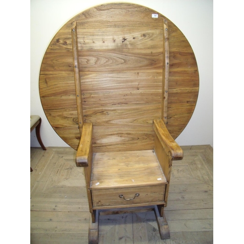 301 - Modern pine monk's style chair with large circular folding top and single drawer to the base (top di... 
