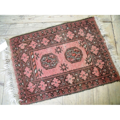33 - Small red ground prayer style rug (71cm x 49cm)