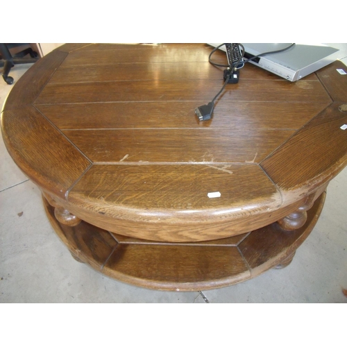 331 - Heavy oak circular two tier coffee table with two drawers (diameter 118cm)