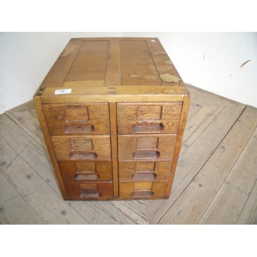 34 - Edwardian golden oak eight drawer filing type desk top cabinet (37cm x 51cm x 42cm)