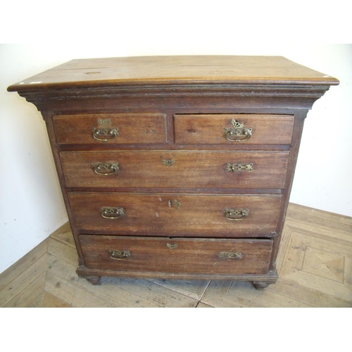 377 - 19th C oak chest with stepped cornice above two short and three long drawers (102cm x 57cm x 100cm)