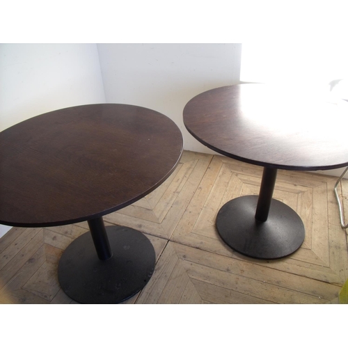 379 - Four pub/café circular top tables with metal bases (diameter 91cm)