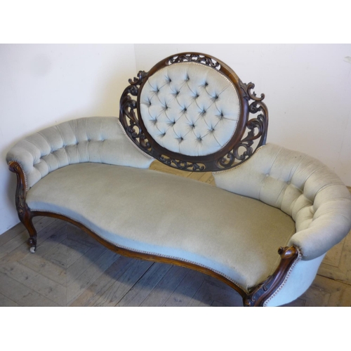 384 - Victorian mahogany framed double ended settee with deep button back and heavily carved frame (width ... 